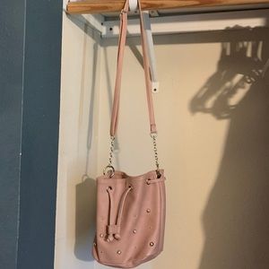 Adjustable blush/cream pink bag
